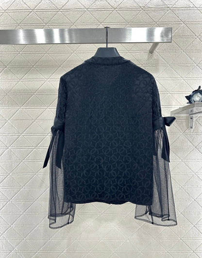 Round neck jacquard bow spliced top