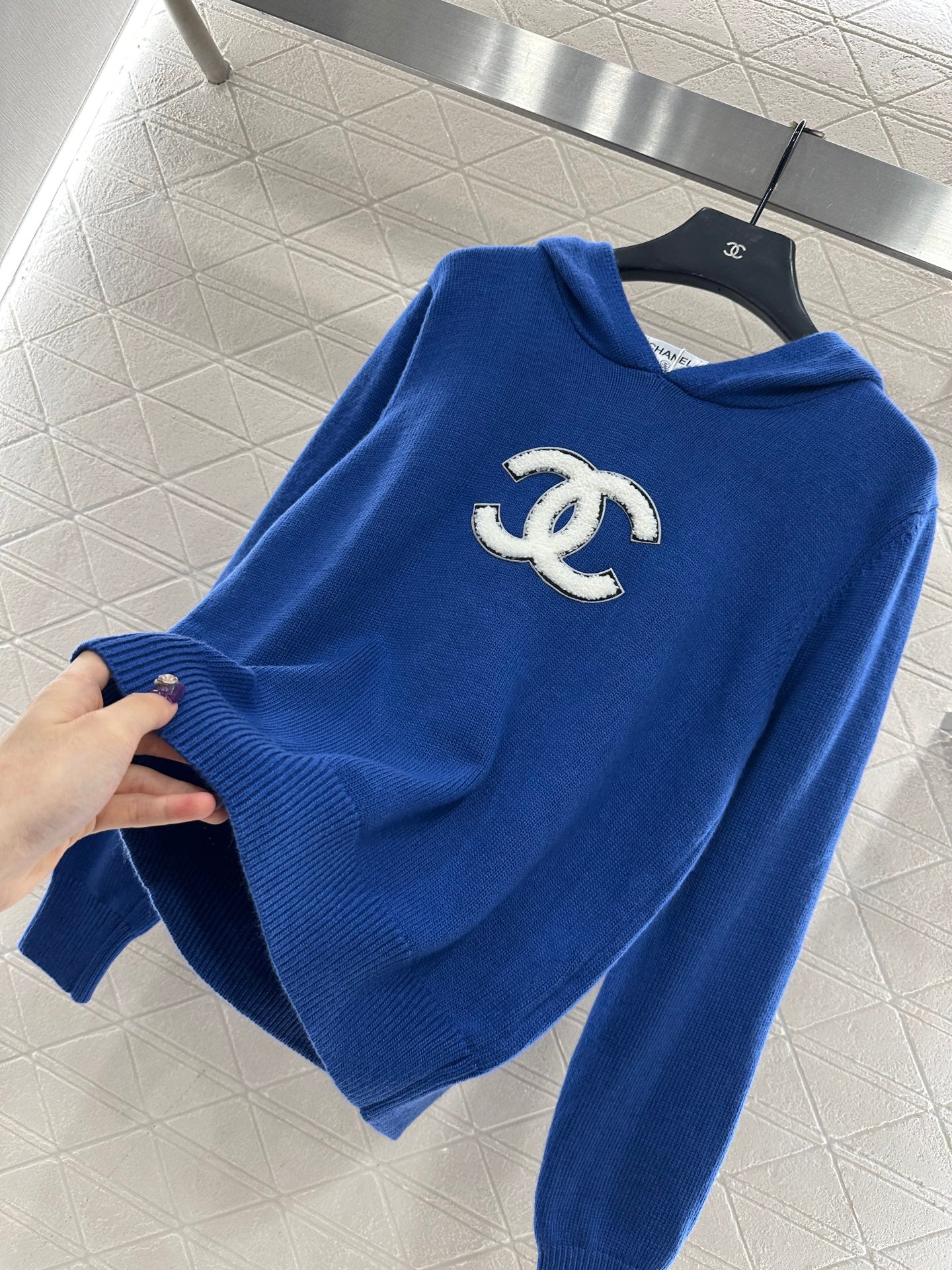 Hooded knitted sweater