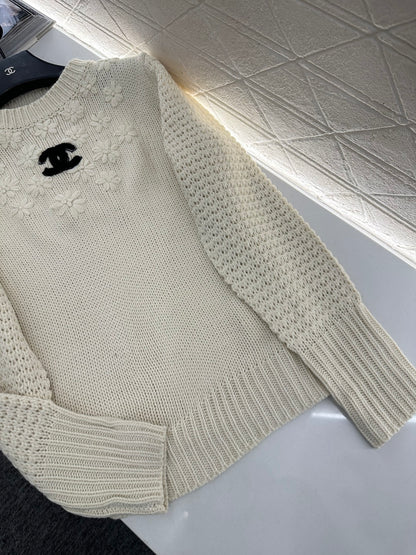 Knitted sweater with hook and loop design