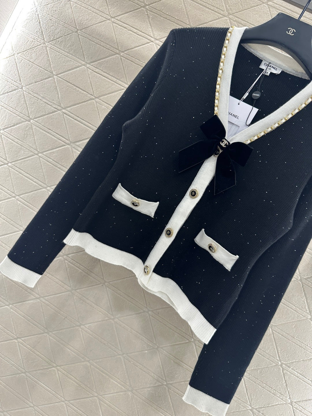 Black and white bow knitted cardigan