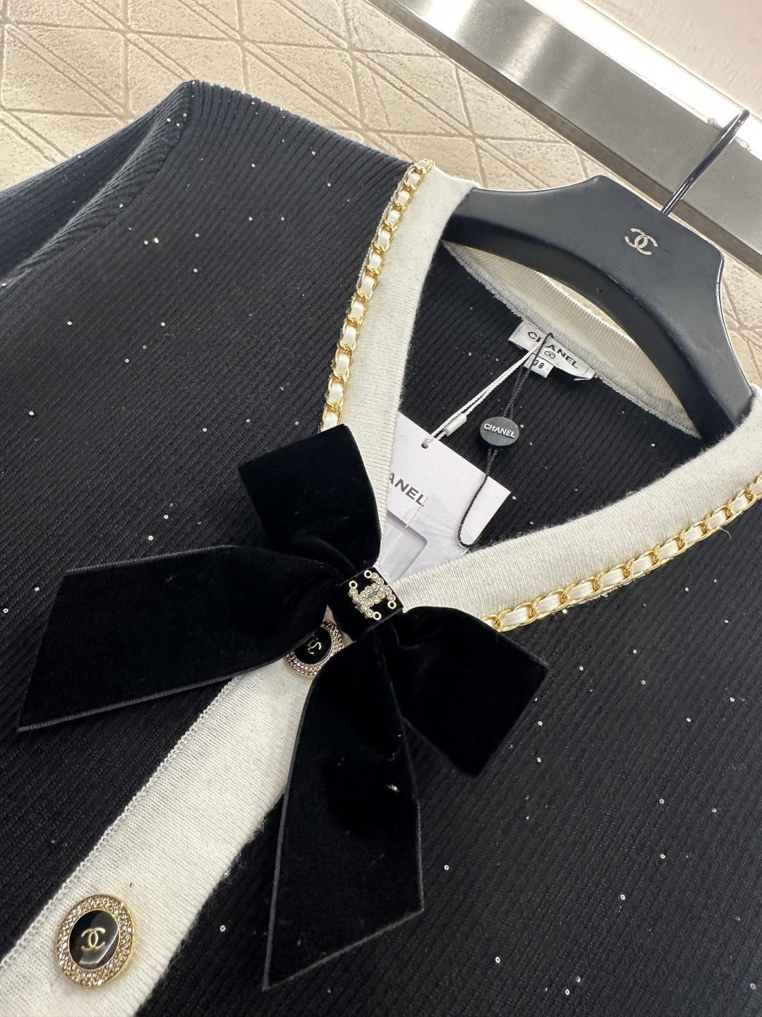 Black and white bow knitted cardigan