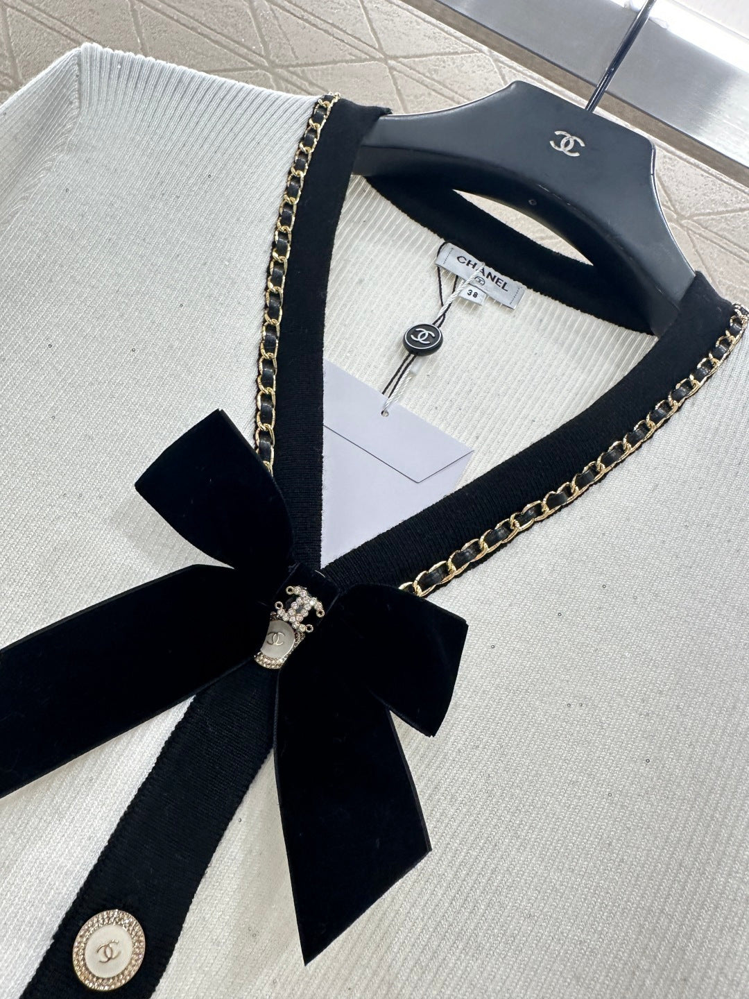 Black and white bow knitted cardigan