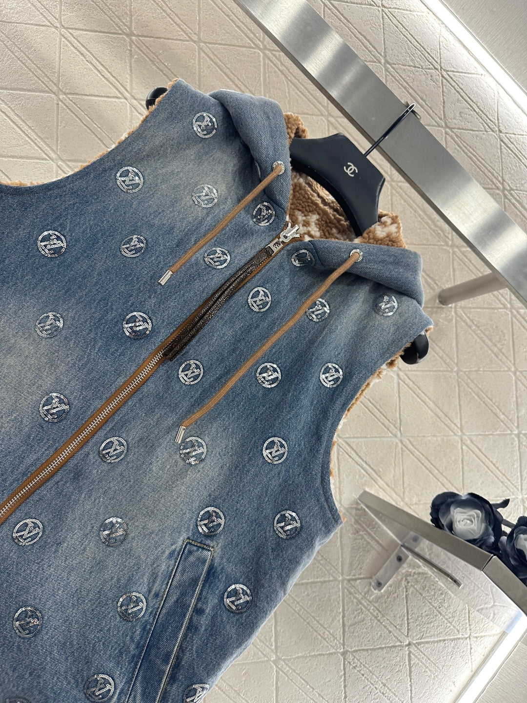 Wearing a hooded teddy lamb vest on both sides