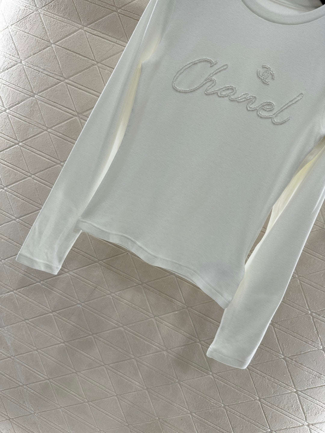 Suede round neck nail bead long sleeved shirt