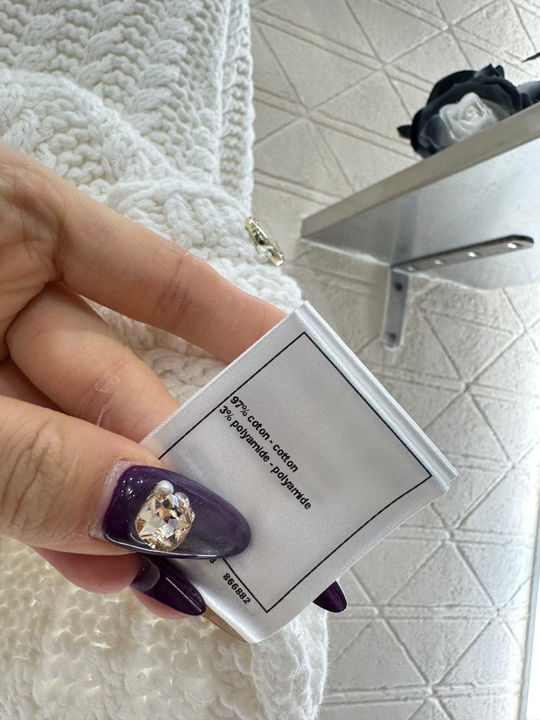 Short knitted short sleeved cardigan