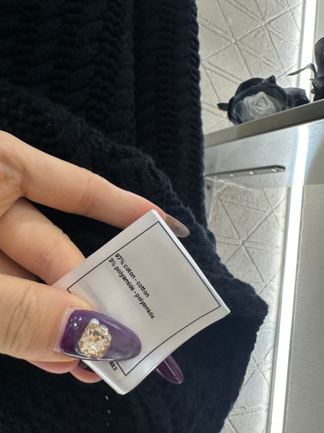 Short knitted short sleeved cardigan