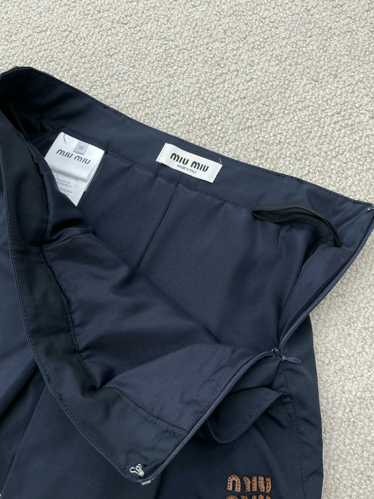 25ss new leather logo skirt