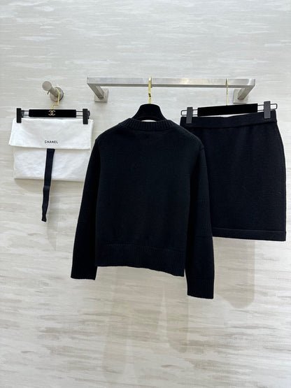 25 Backpack buckle cashmere cardigan + skirt