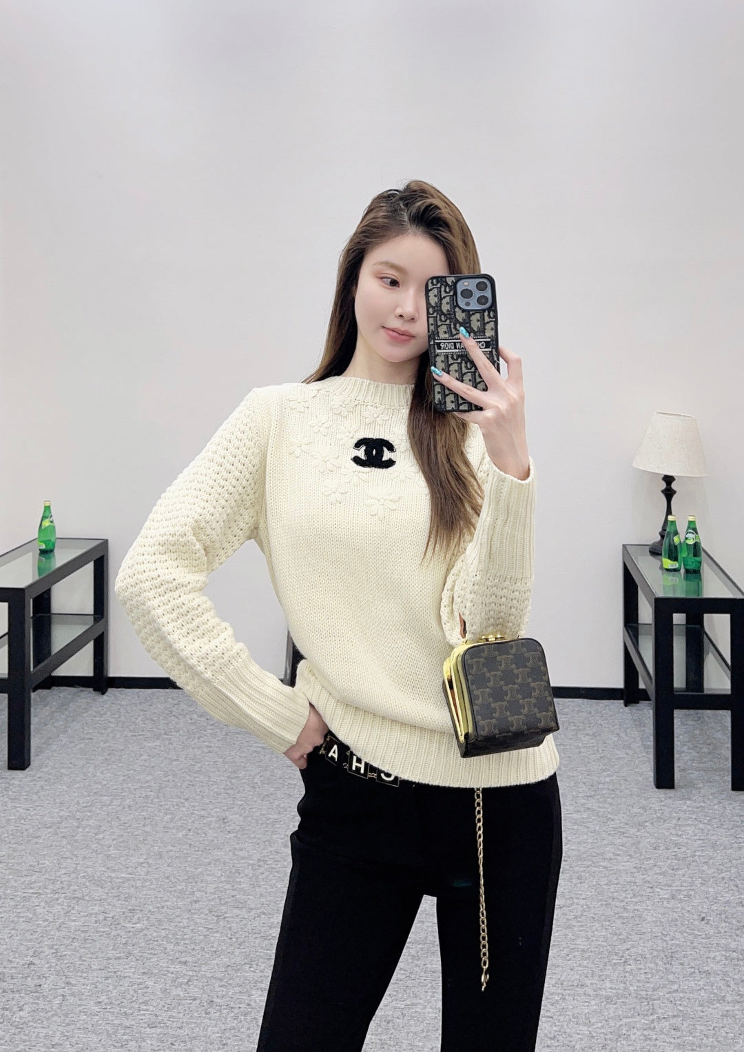 Knitted sweater with hook and loop design