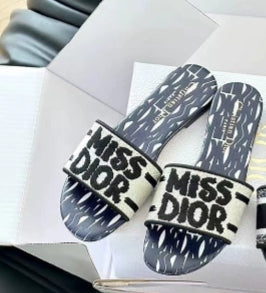 Embroidered letter slippers