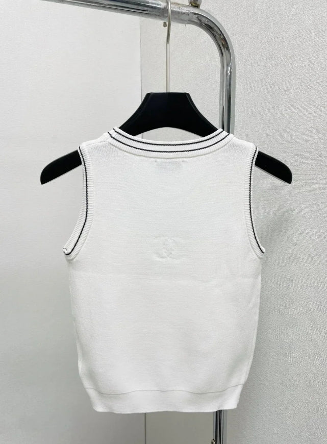 round neck vest with handmade beads on the chest