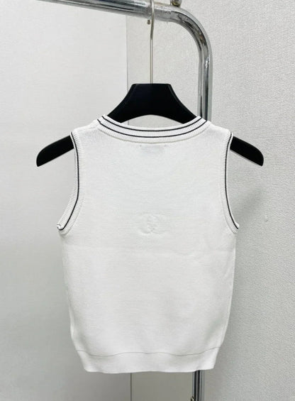 round neck vest with handmade beads on the chest