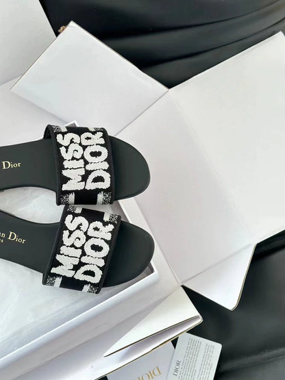 Embroidered letter slippers