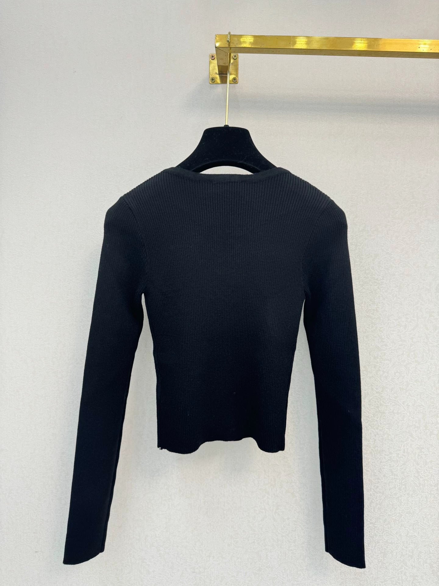 Black knitted long sleeved top
