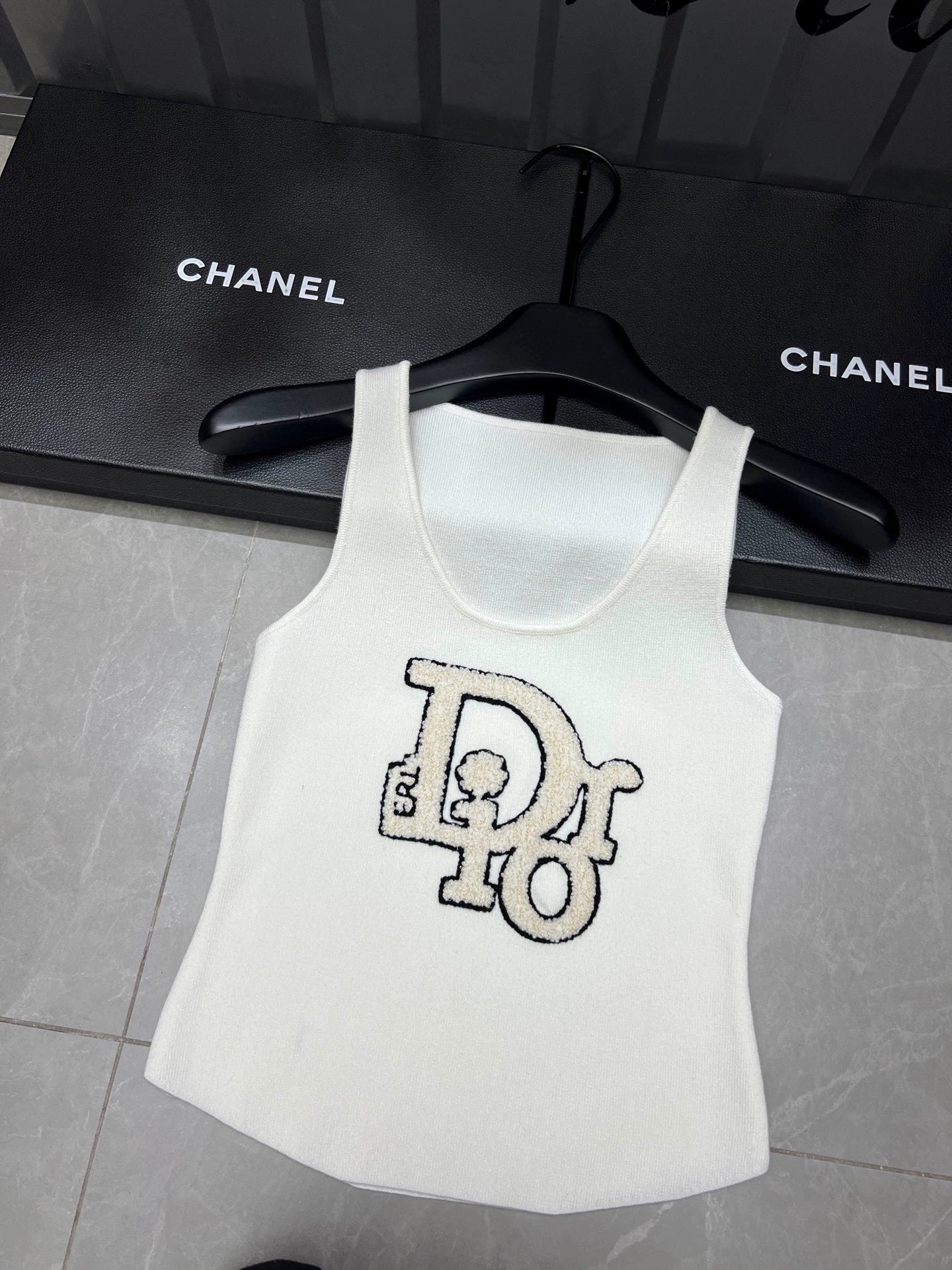 25 Flocked letter vest