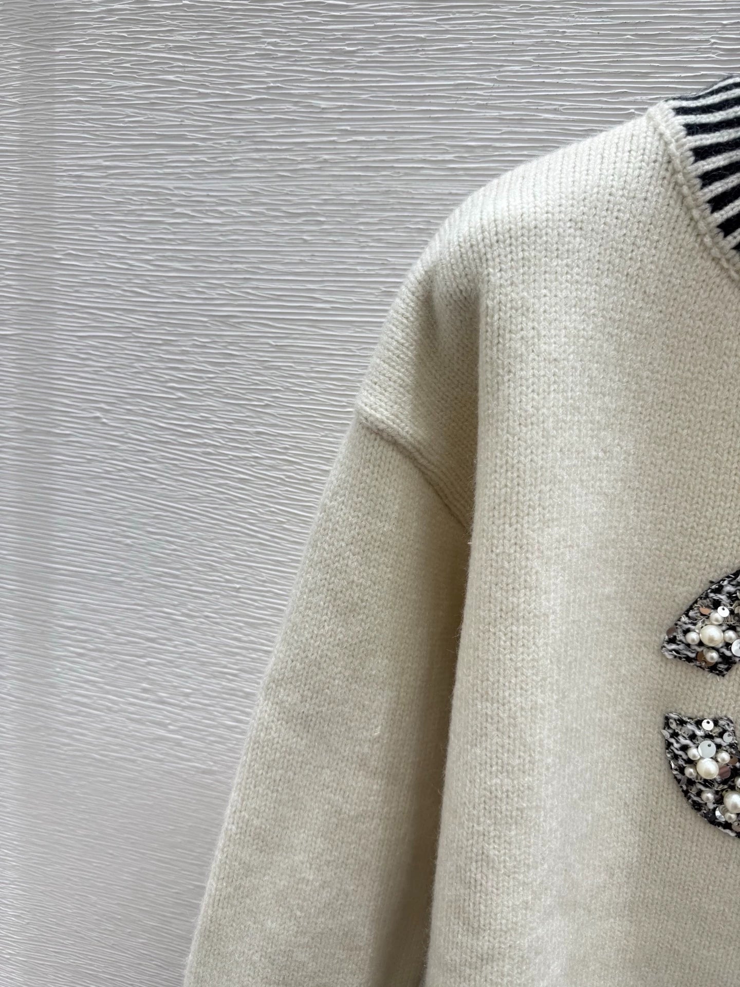 Black and white contrasting diamond patterned sweater