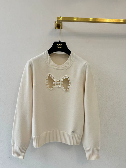 Bow hollow knitted sweater