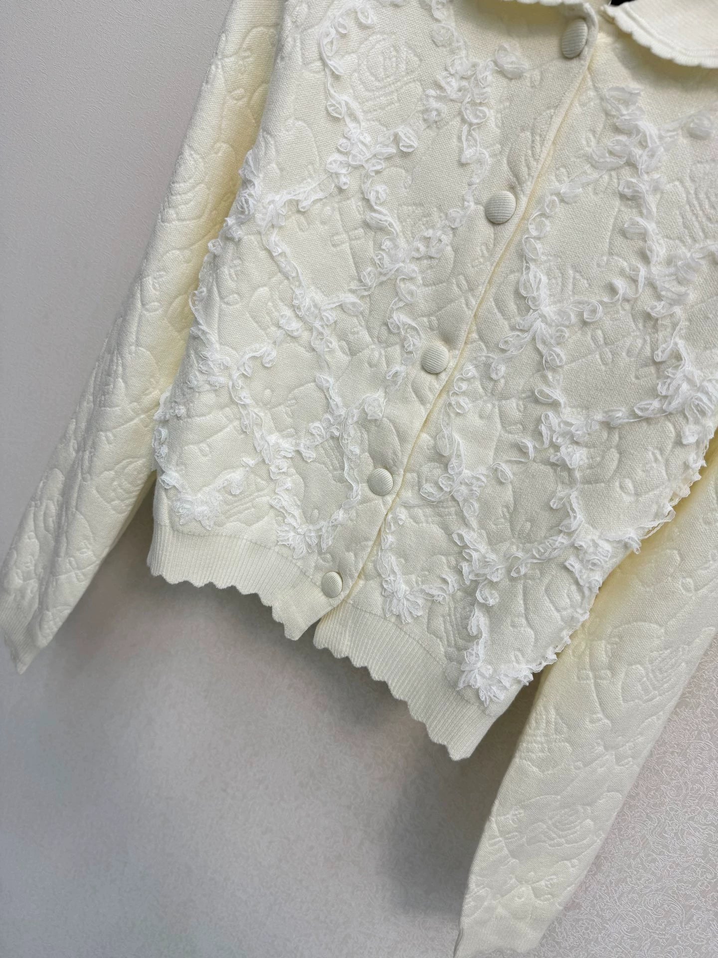 White knitted cardigan