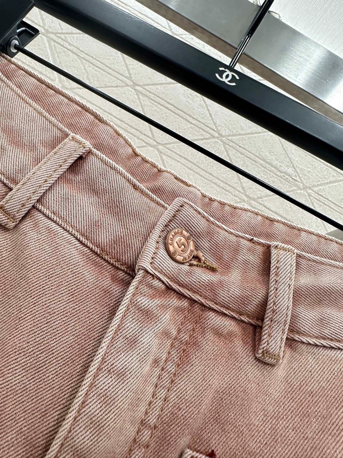 Pink ground white straight leg denim pants