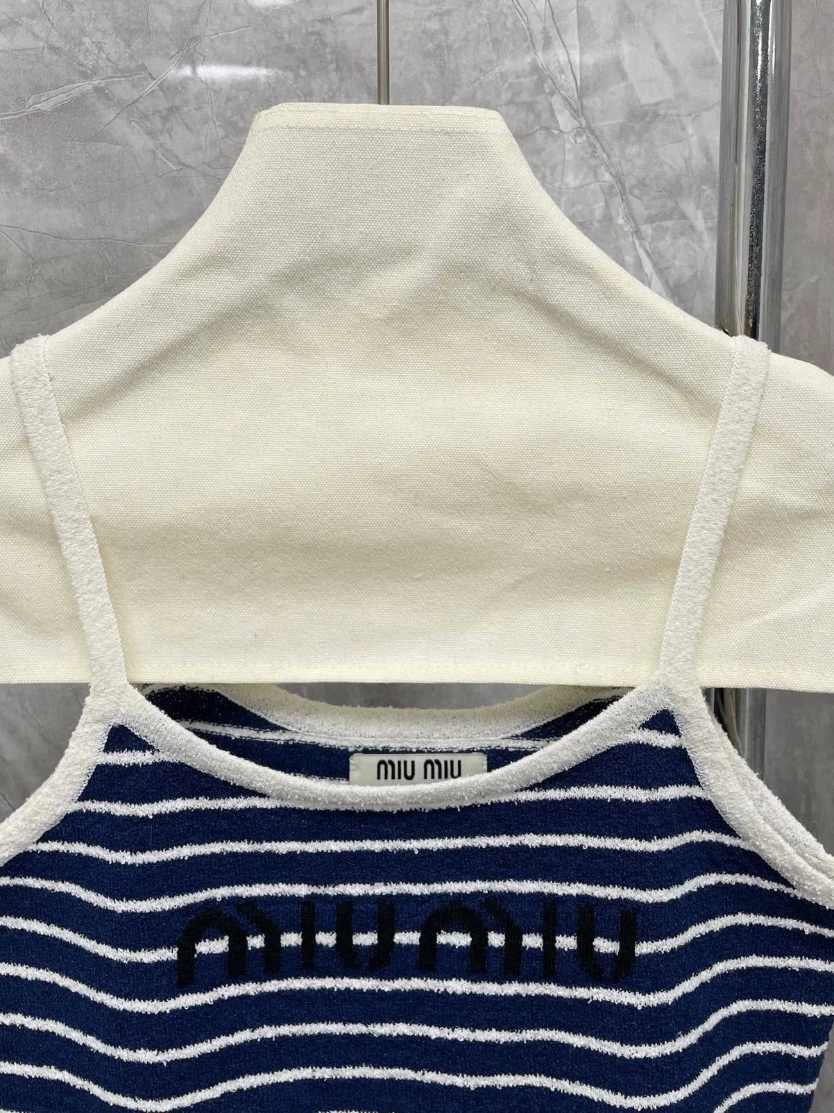 25 Summer new dark blue striped sweater suspender top + skirt set