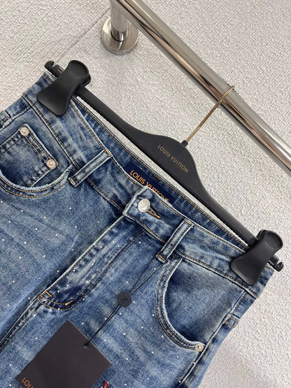 25FW rhinestone logo embroidered denim pants