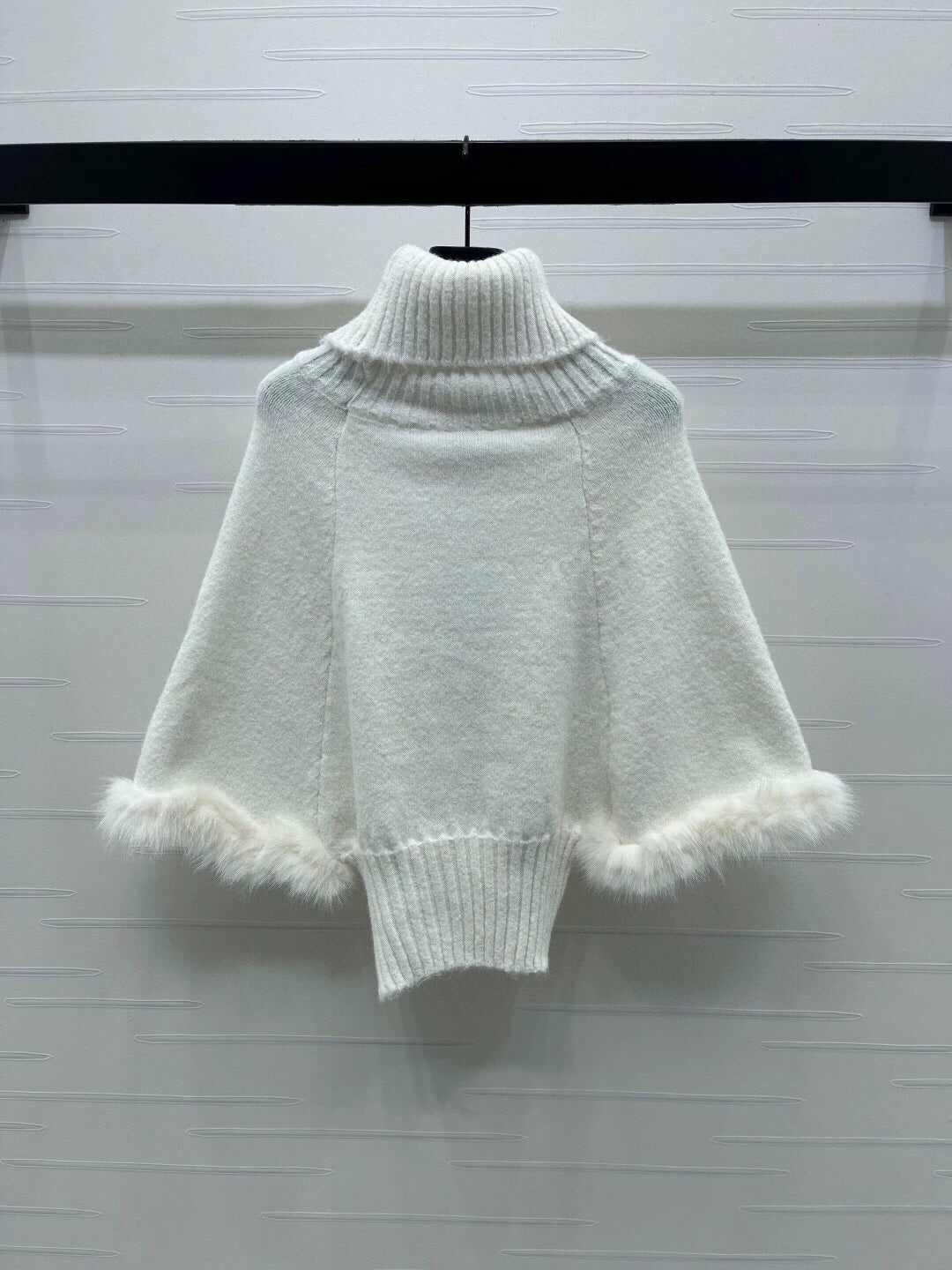 White high necked sweater