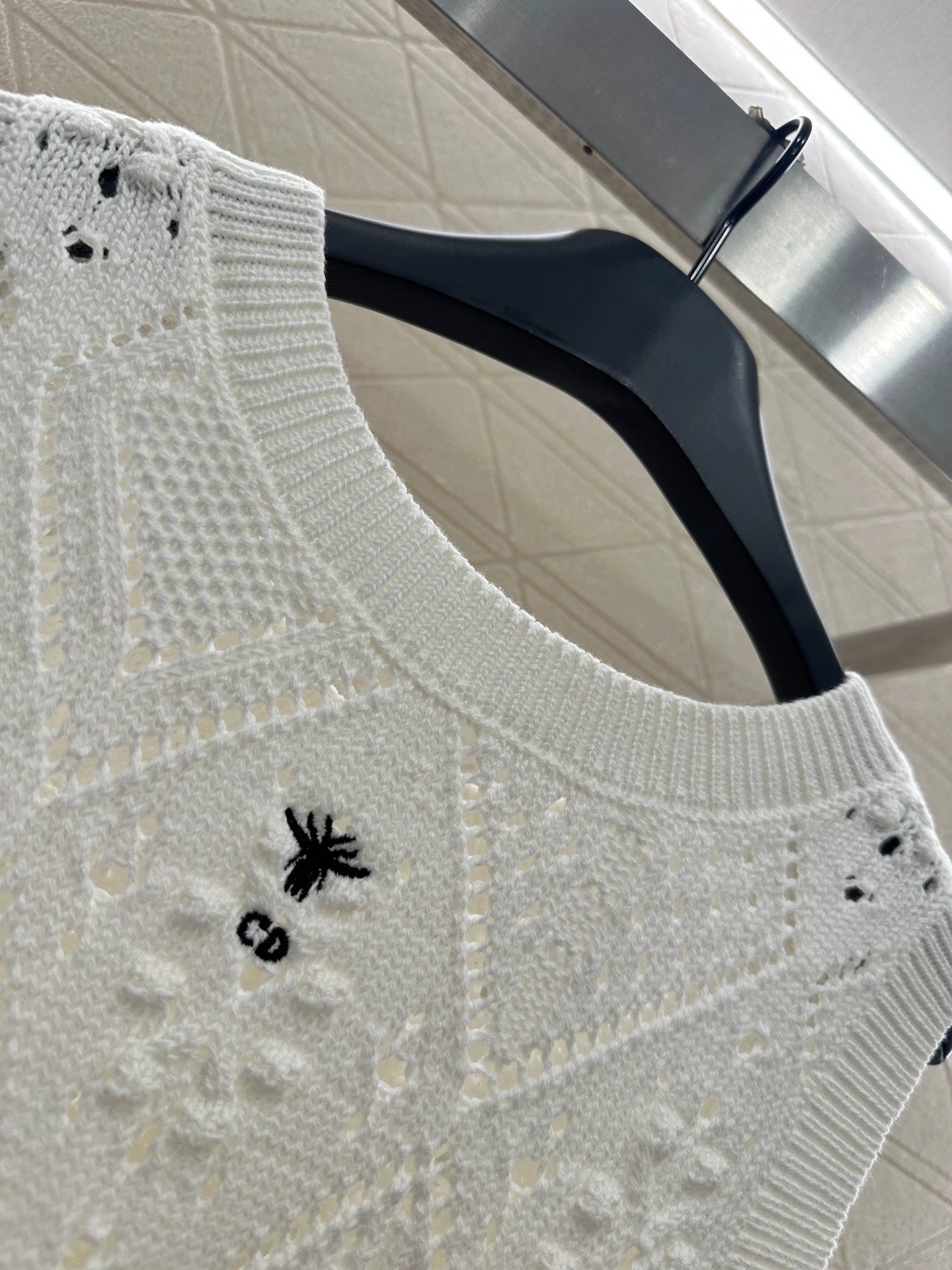 Hollow jacquard knitted vest