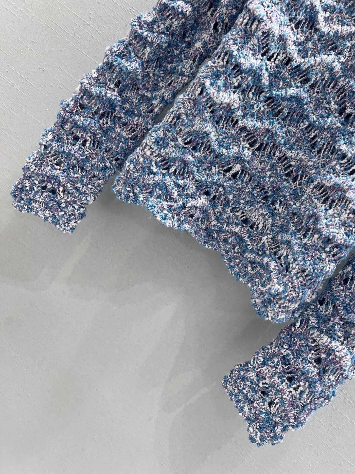 Wavy-patterned openwork knit cardigan