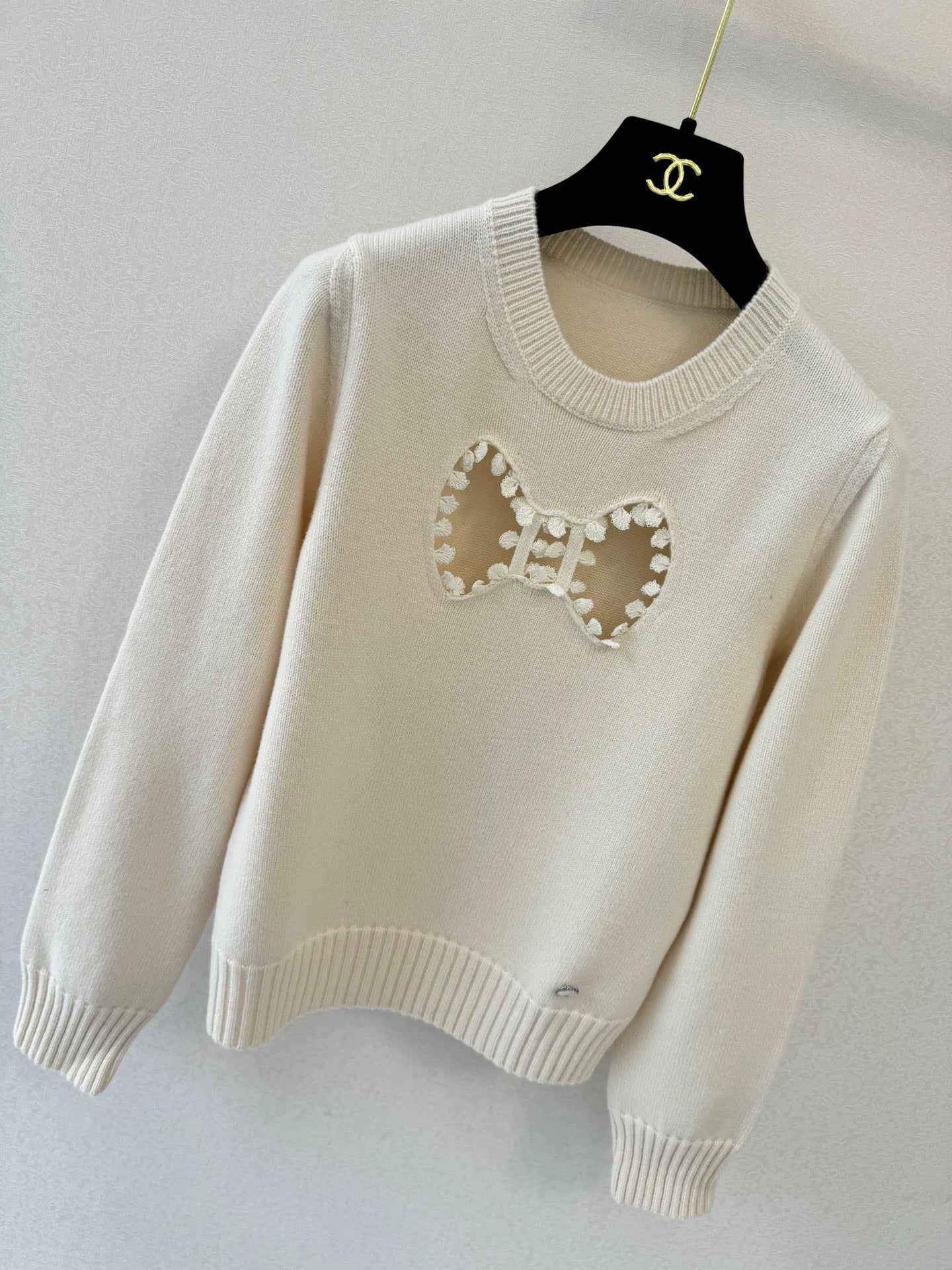 Bow hollow knitted sweater