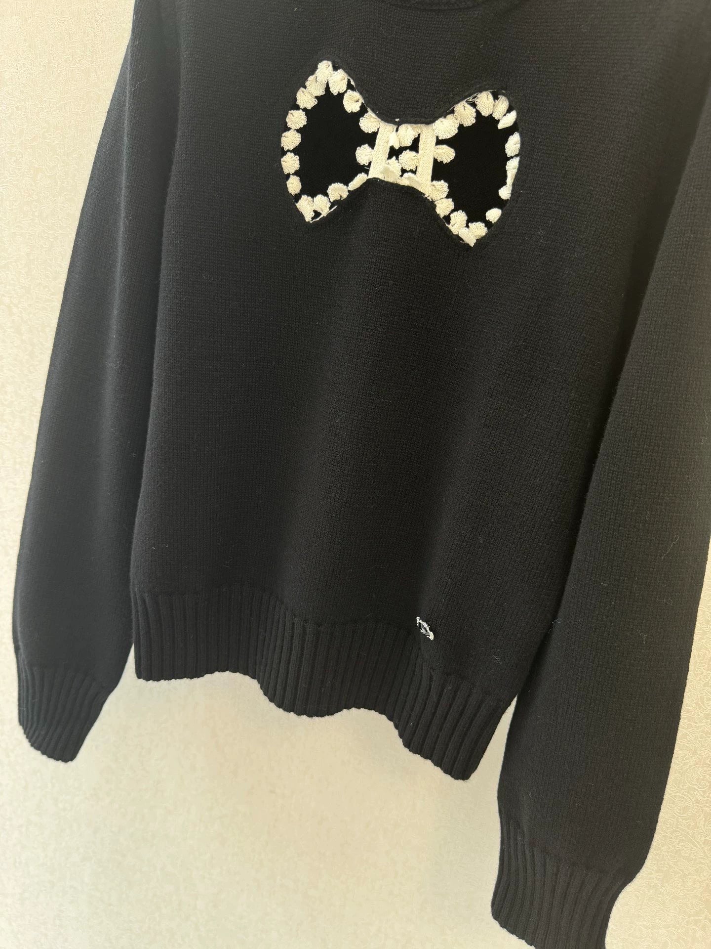 Bow hollow knitted sweater