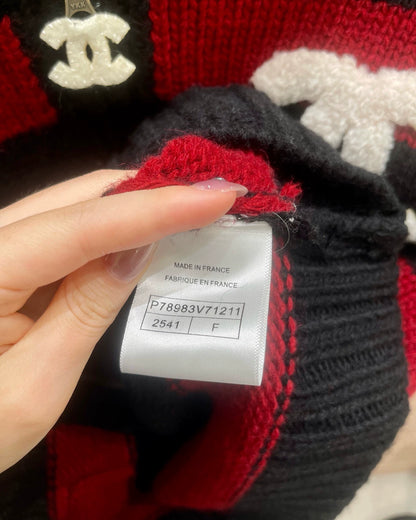 Red and black striped knitted cardigan