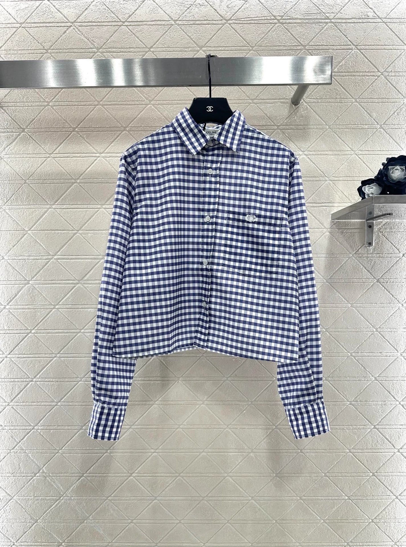 Short blue and white checkered shirt