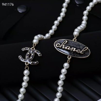 Elliptical pearl sweater chain