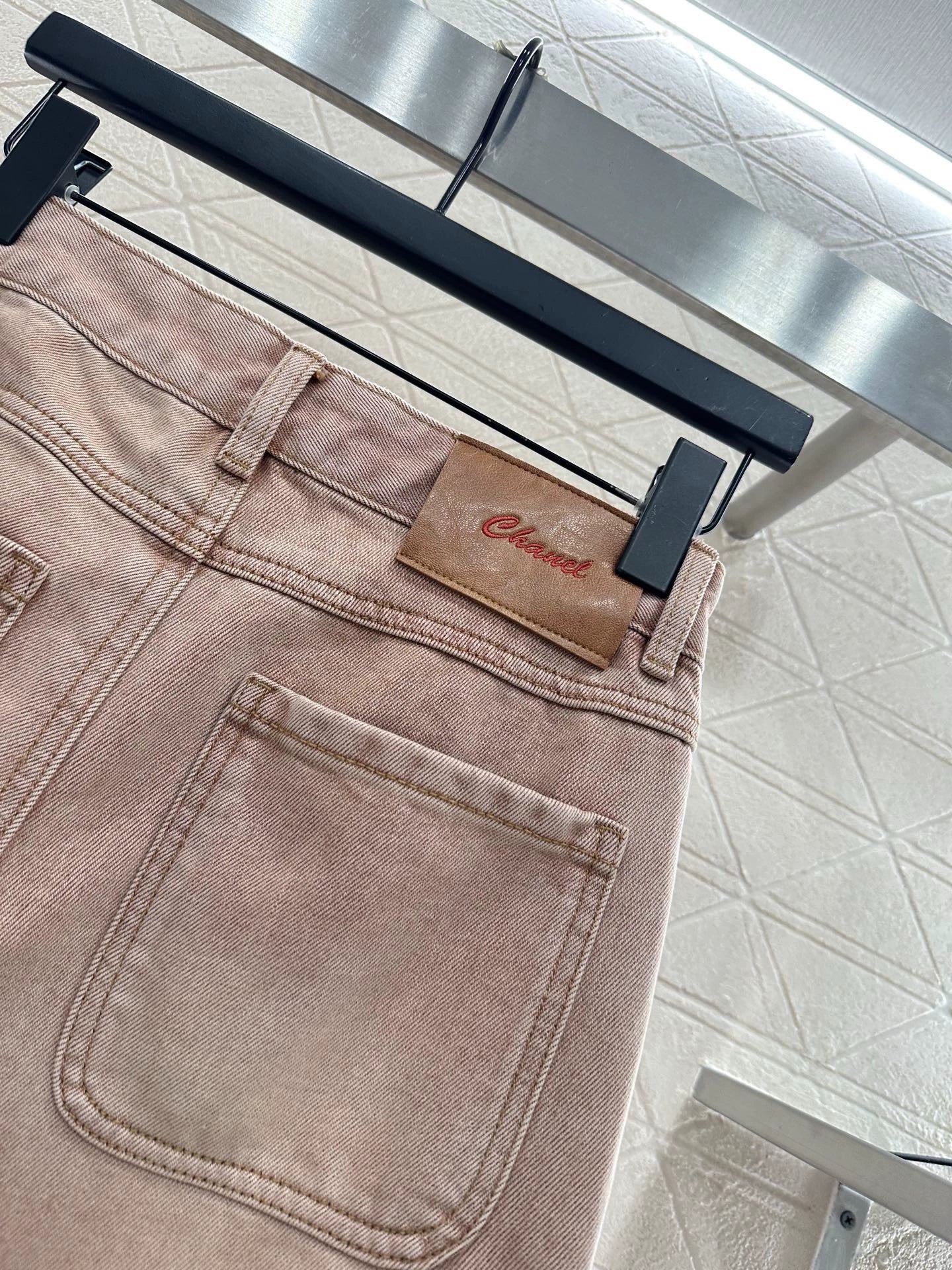 Pink ground white straight leg denim pants