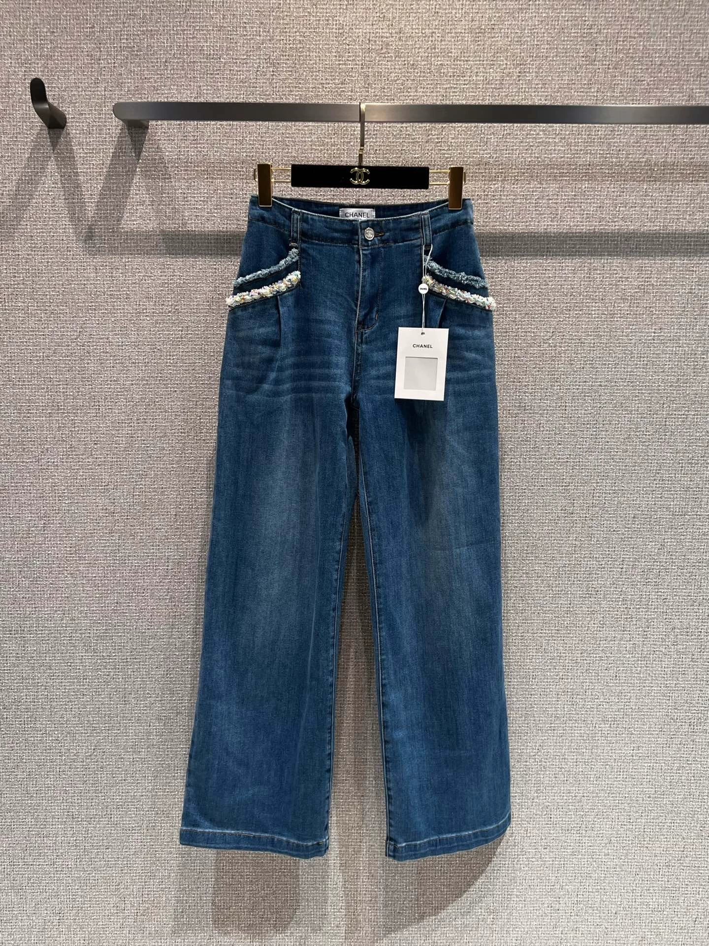 Pearl and rhinestone embellished wide-leg jeans