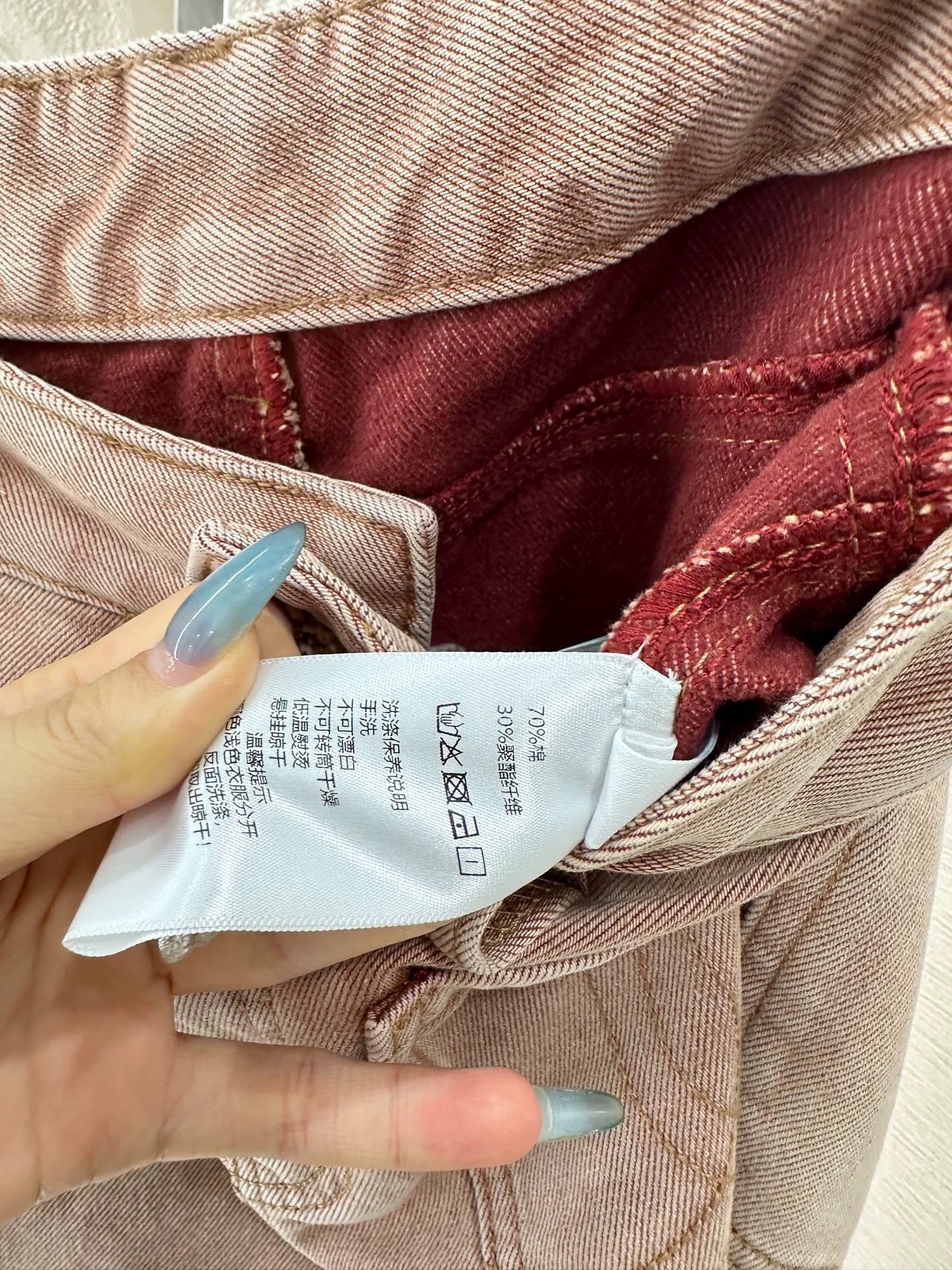 Pink ground white straight leg denim pants