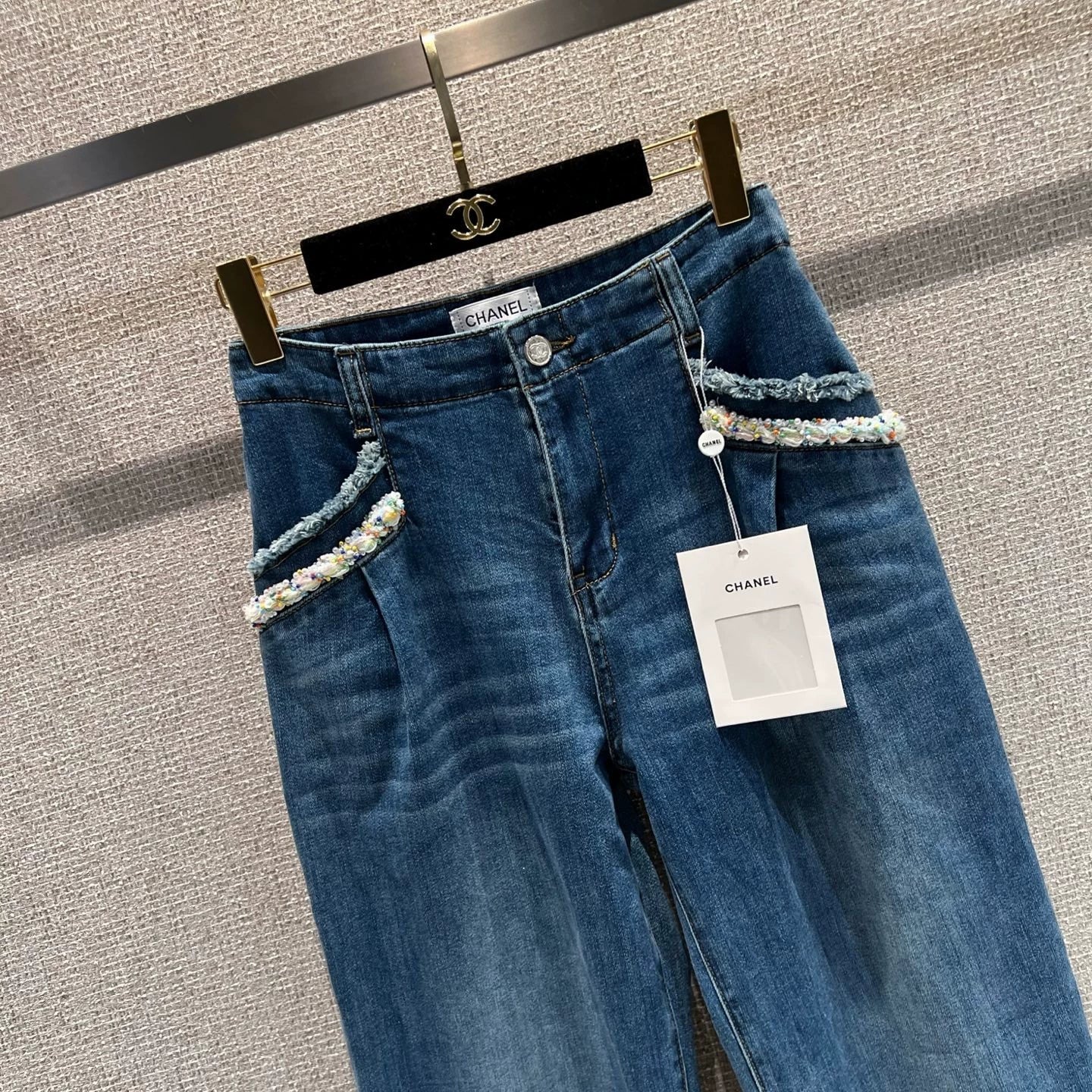 Pearl and rhinestone embellished wide-leg jeans