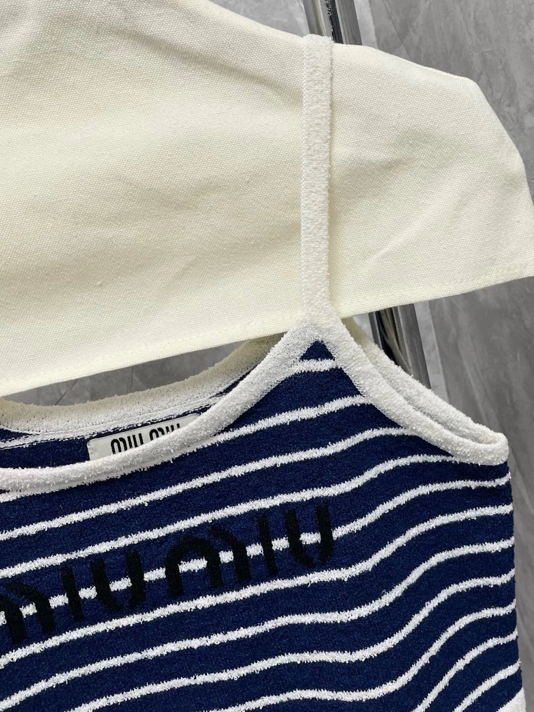 25 Summer new dark blue striped sweater suspender top + skirt set