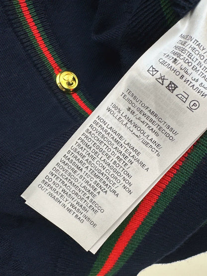 25 Knitted cardigan with woven pattern and V-neck