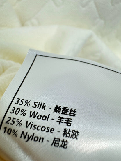 White knitted cardigan