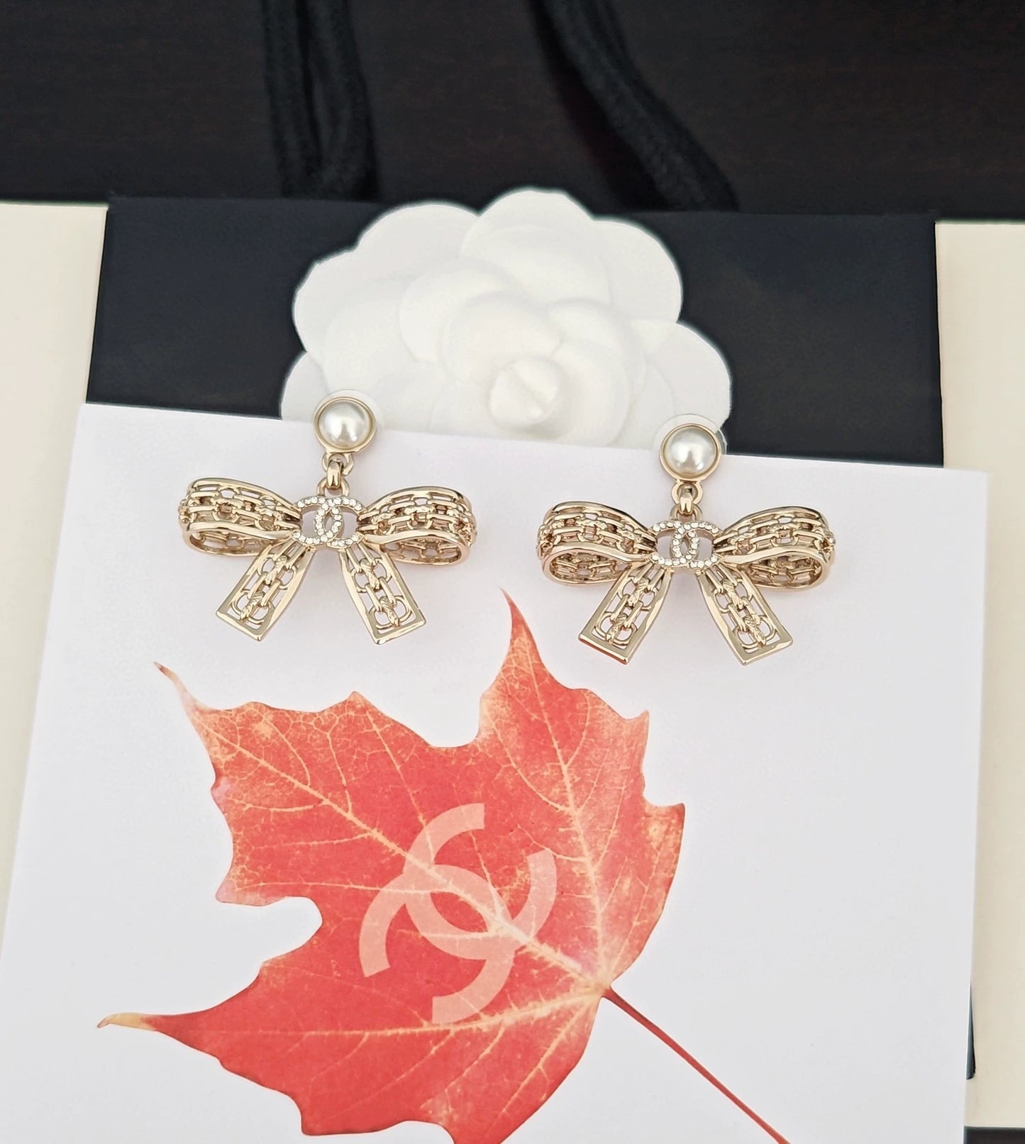Light gold hollow bow earrings