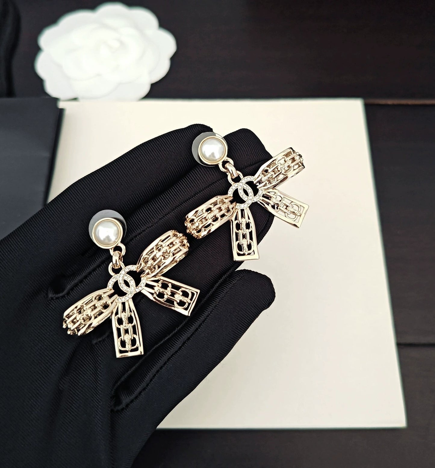 Light gold hollow bow earrings