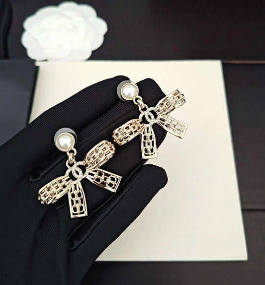 Light gold hollow bow earrings