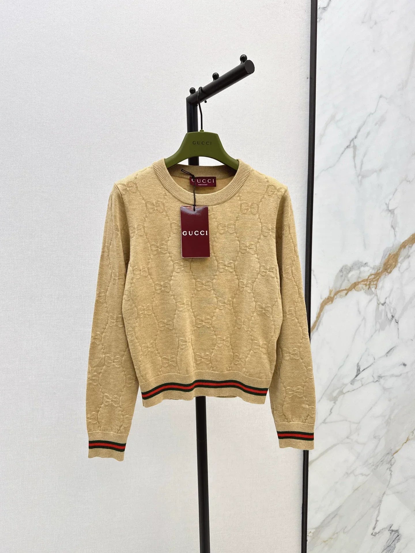 25 Knitted sweater with woven pattern round neck