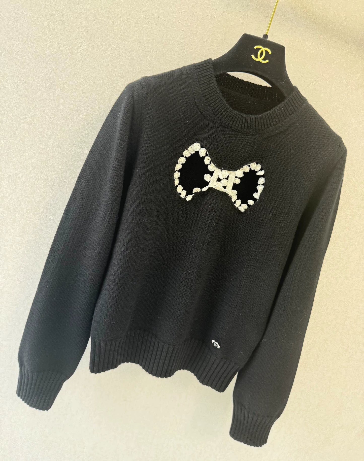 Bow hollow knitted sweater