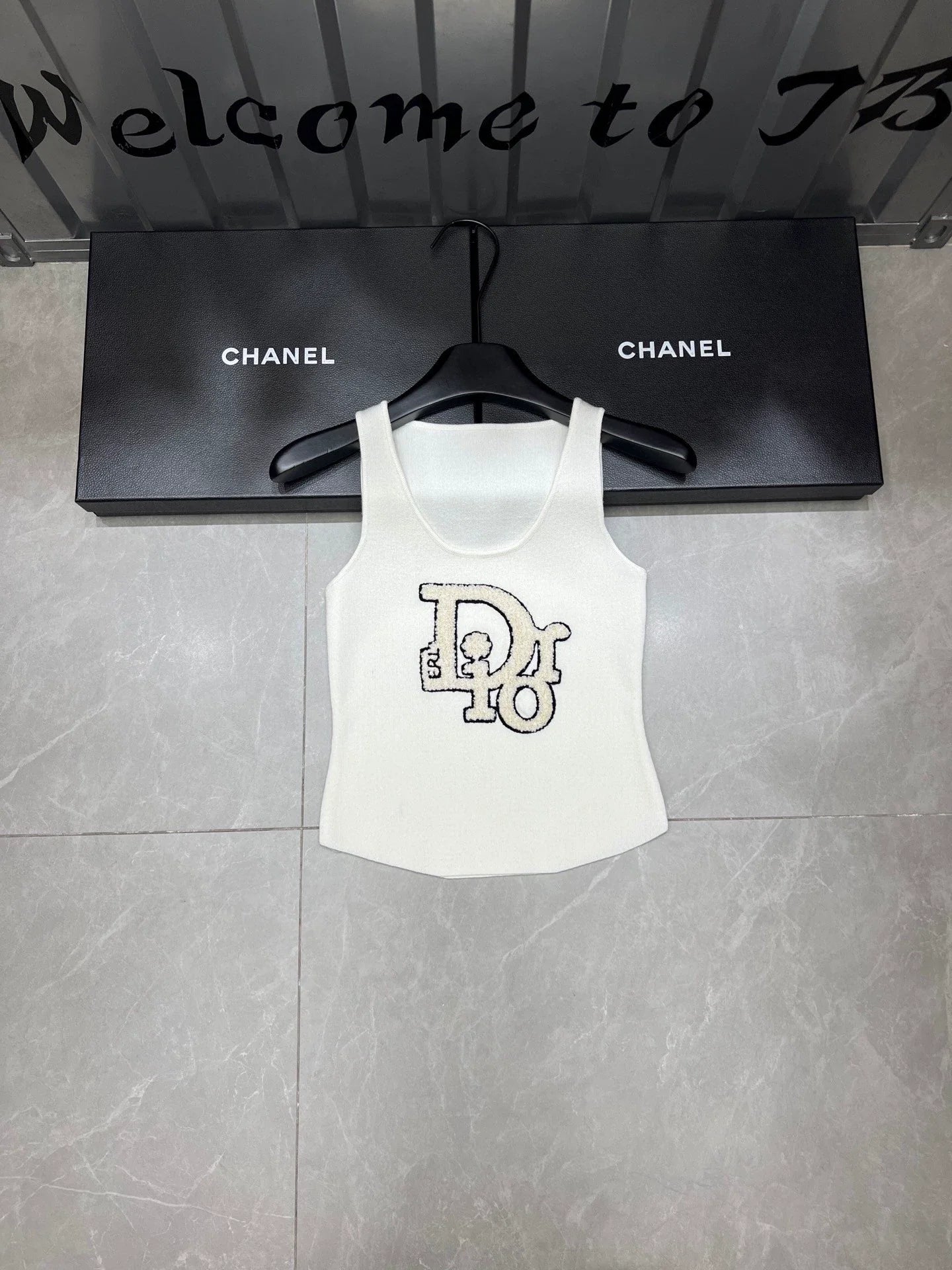 25 Flocked letter vest