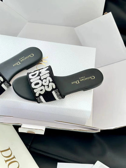 Embroidered letter slippers