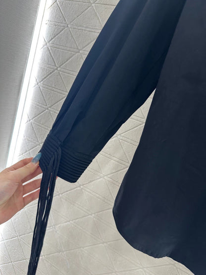 Artistic collar button tassel long sleeved shirt