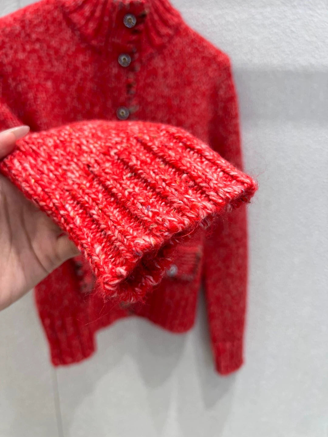 Stand up collar long sleeved sweater jacket