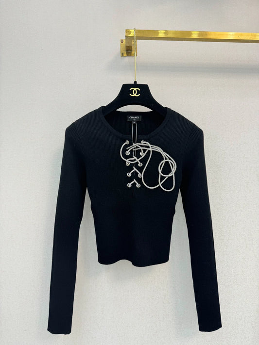 Black knitted long sleeved top